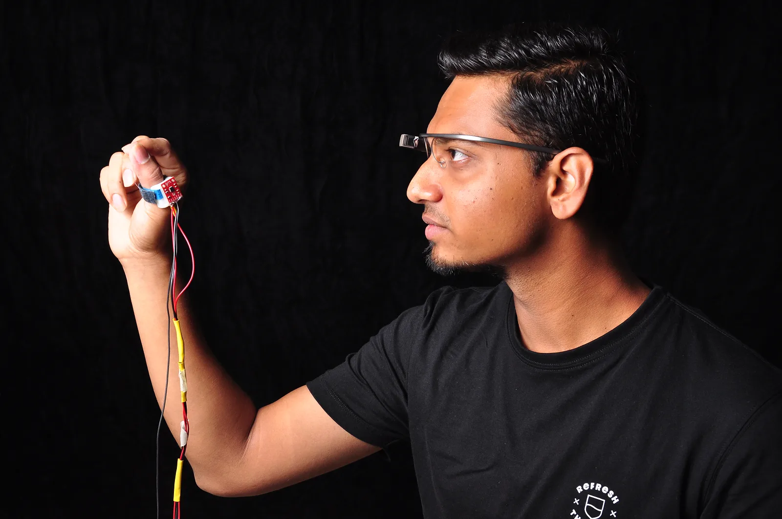 Anandghan Waghmare holding a sensing prototype