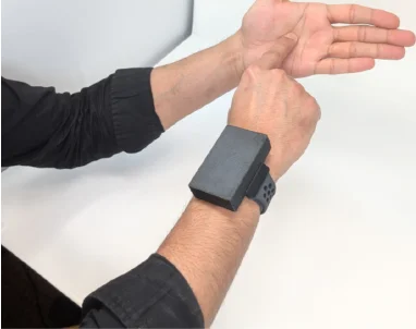 Your own palm becomes a touchpad: taps and swipes on the other hand are detected as input.